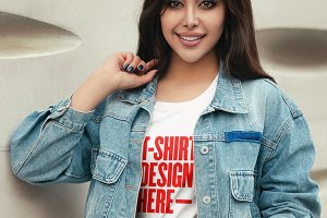 Standing Girl Wearing T-Shirt Mockup with Denim Jacket